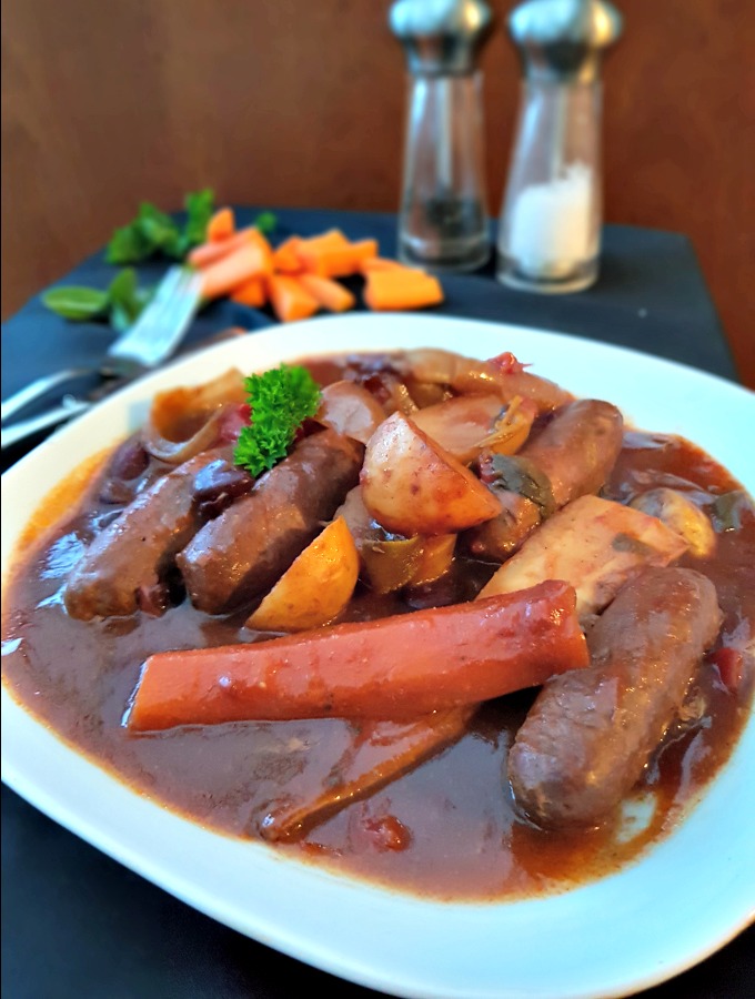 This sausage casserole slow cooker recipe is hearty, warming food with very little prep (my favourite kind of meal!) - just chuck it in and leave it to cook.